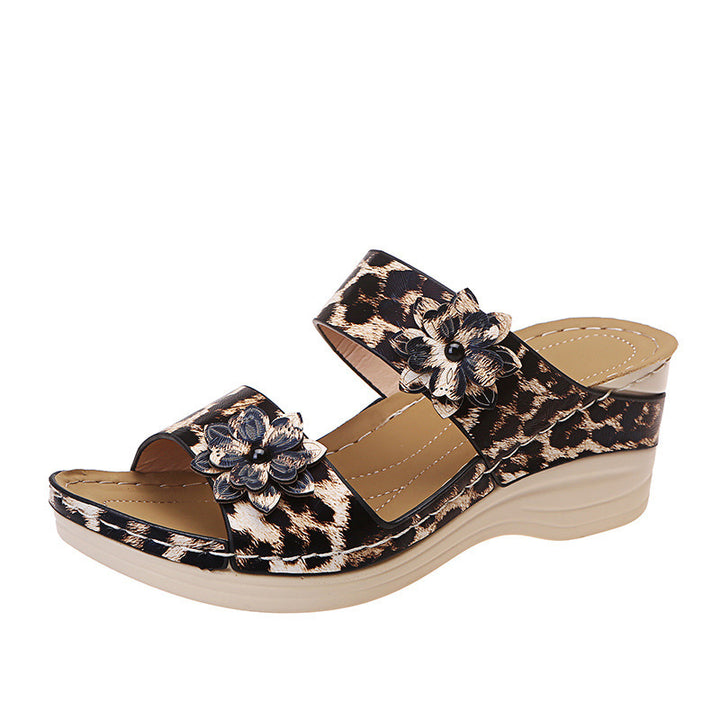 Comfortable wedge sandals for women with floral appliqués and elastic straps Lune London