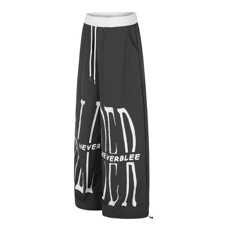 Women's wide loungewear pants with high comfort waistband, drawstring, adjustable hem, and typographic print Amarae