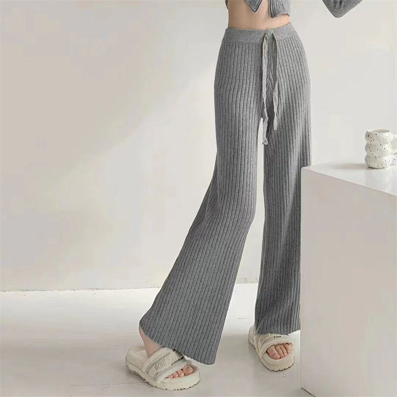 Pull-over croisé pour femmes avec décolleté en V profond et texture côtelée Chic & Stil