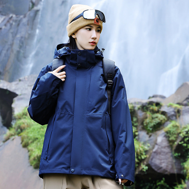 Women’s technical multi-layer hardshell rain jacket with adjustable hood, chest strap, and water-resistant zippers Amarae