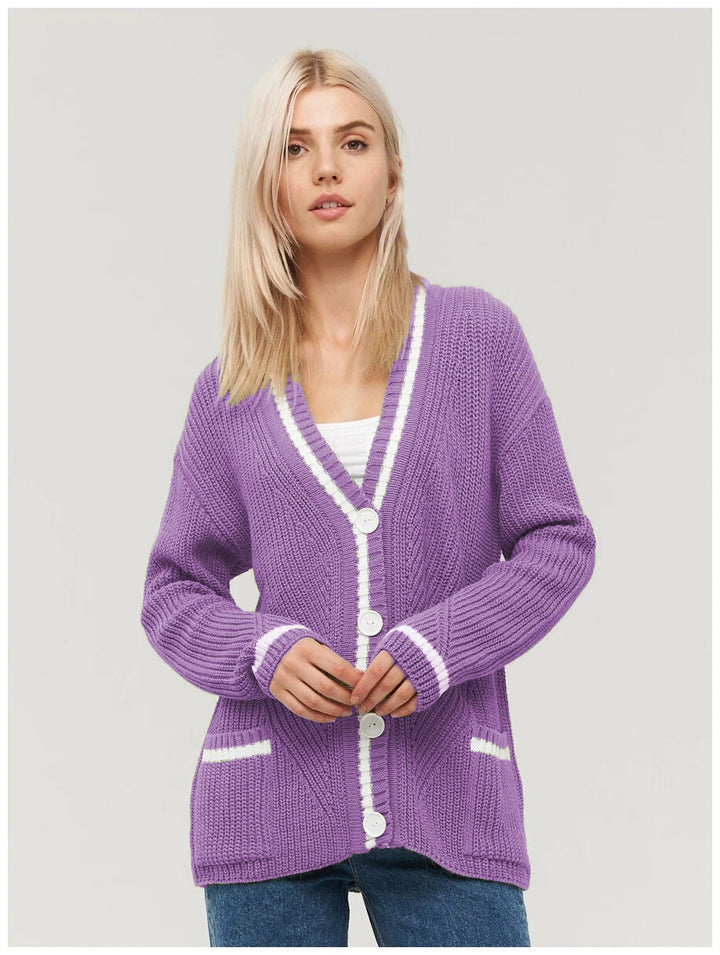 Ladies chunky knitted jacket with practical flap pockets and contrasting details Lune London