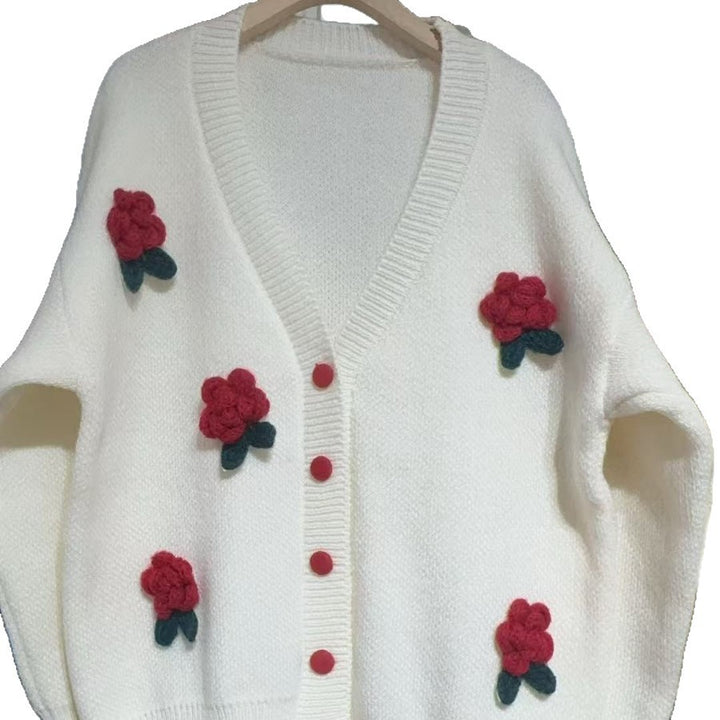 Women’s playful knitted cardigan with floral appliqués and Moon London button details