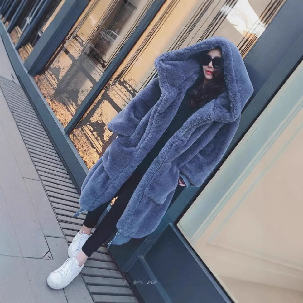 Oversized faux fur coat for women with hood and pockets Lune London