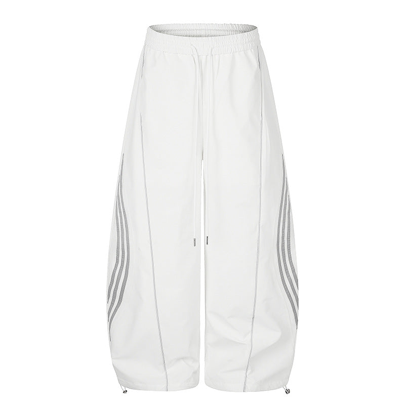 Women's Wide Tech Material Palazzo Pants with Drawstring Waistband, Reflective Side Stripes and Adjustable Cord Hem