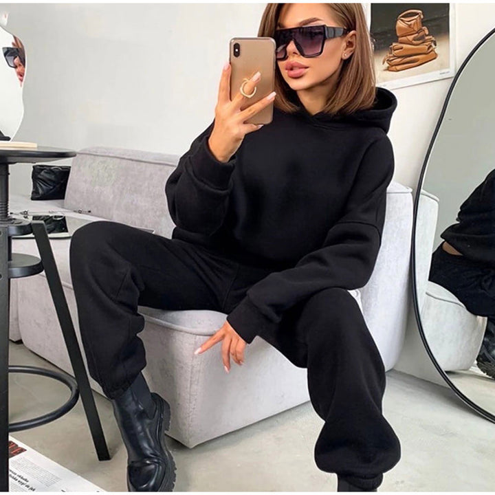 Women's comfortable hooded jumpsuit with a loose fit and elastic waistband Chic & Stil