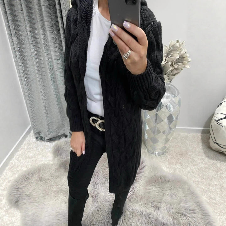Thick knit jacket for women with an elegant cable pattern and a practical hood Lune London
