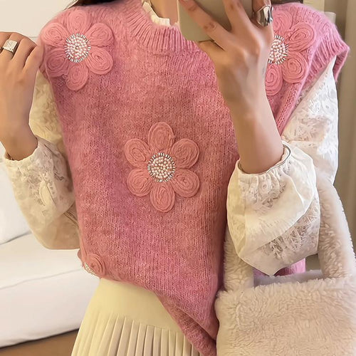 Pull en maille pour femme avec des appliqués floraux et une surface texturée Chic & Stil