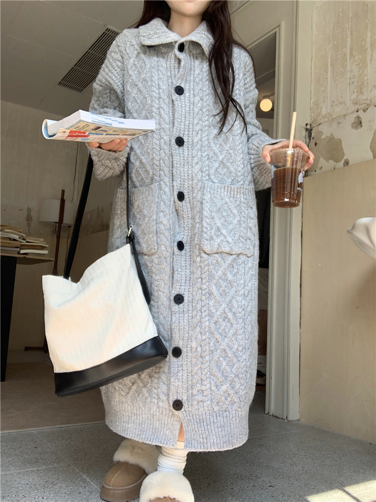 Thick knit button coat for ladies with an elegant cable pattern and practical pockets Lune London