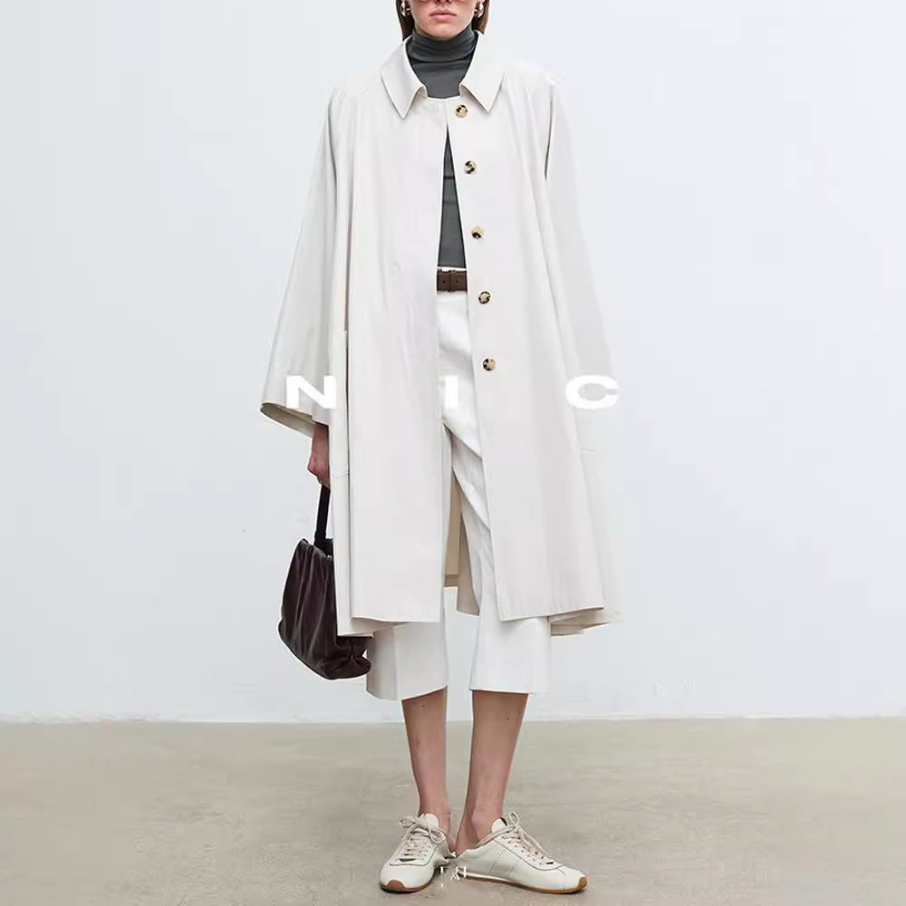 Manteau de trench décontracté pour femmes avec des manches surdimensionnées et des détails de boutons Chic & Stil