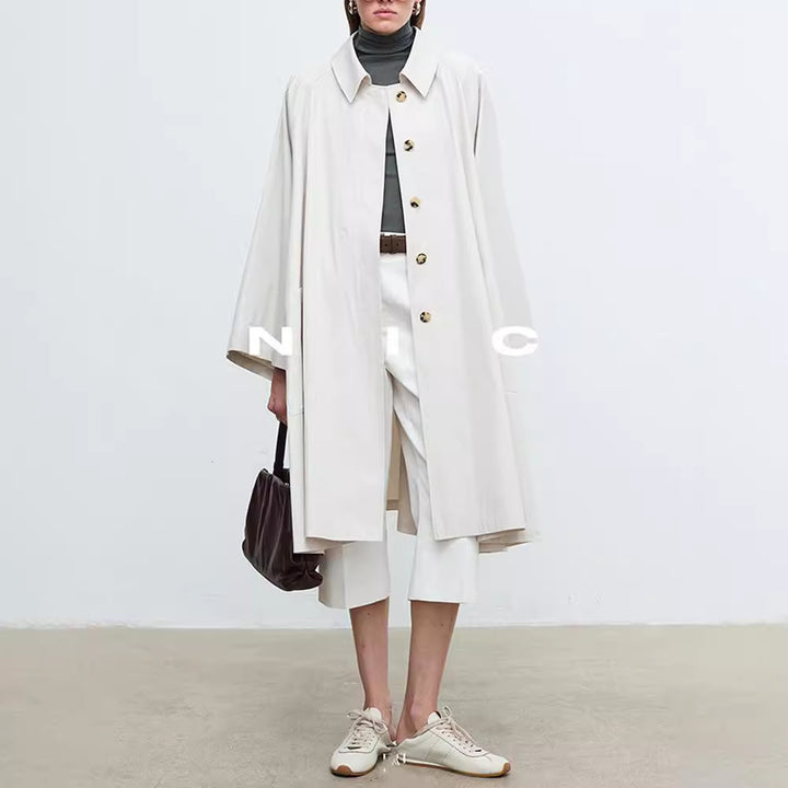 Manteau de trench décontracté pour femmes avec des manches surdimensionnées et des détails de boutons Chic & Stil