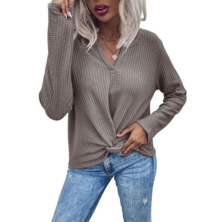 Women's casual long sleeve t-shirt with button details and textured design Lune London