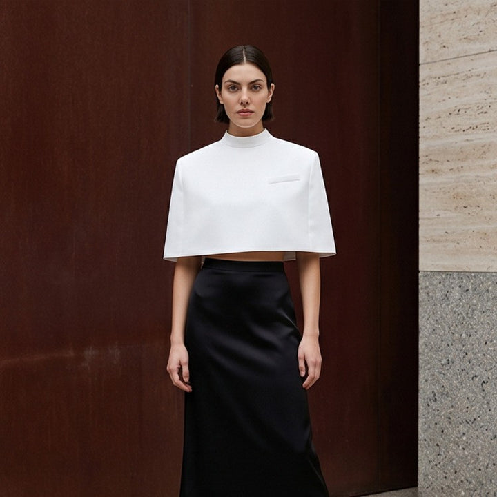 Women Short-Cut Sculptural Cape Top with Stand Collar Amarae