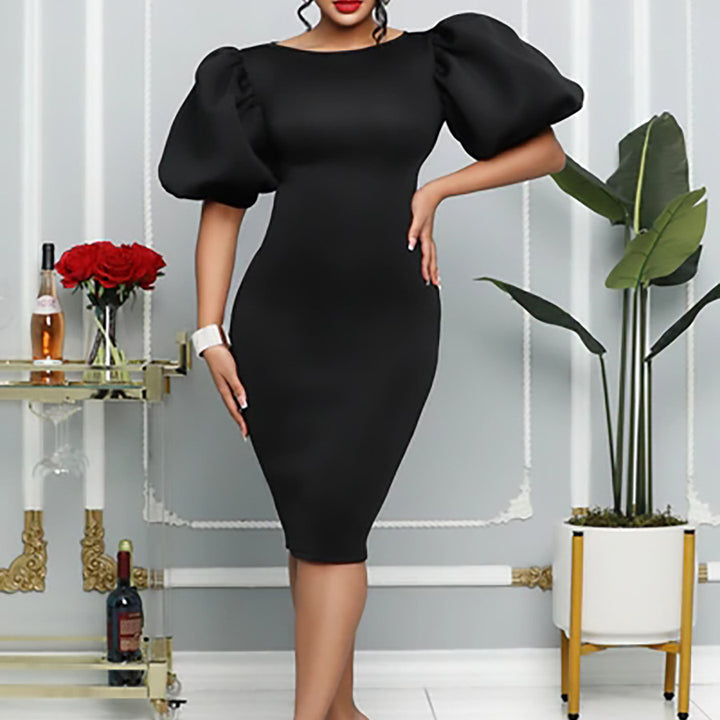 Fitted dress for ladies with voluminous puff sleeves Lune London