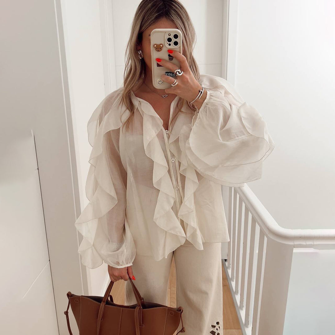 Blouse woman with voluminous ruffle details and a wavy hem Lune London