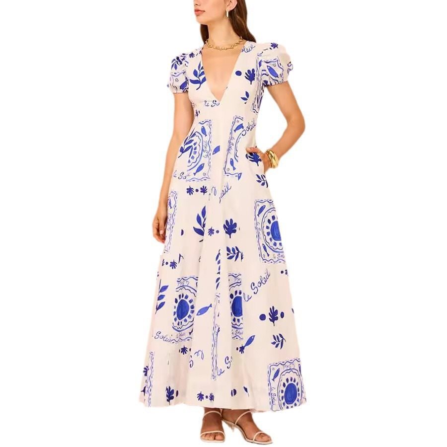 Maxi dress for women with voluminous puff sleeves and floral patterns Lune London