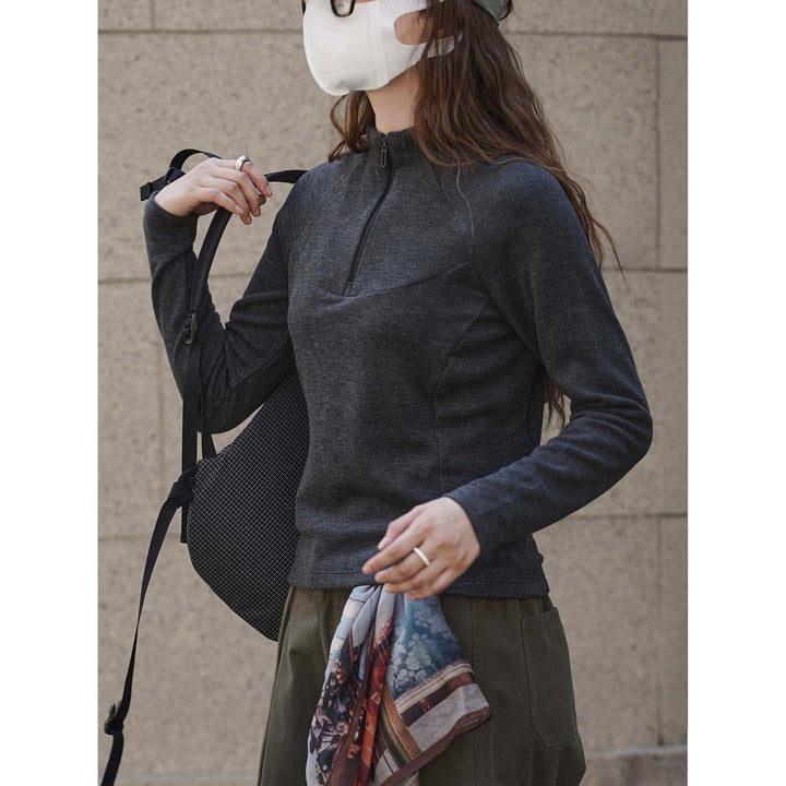Women's fine-knit shirt with short zipper, raglan sleeves, and tailored seam design Amarae