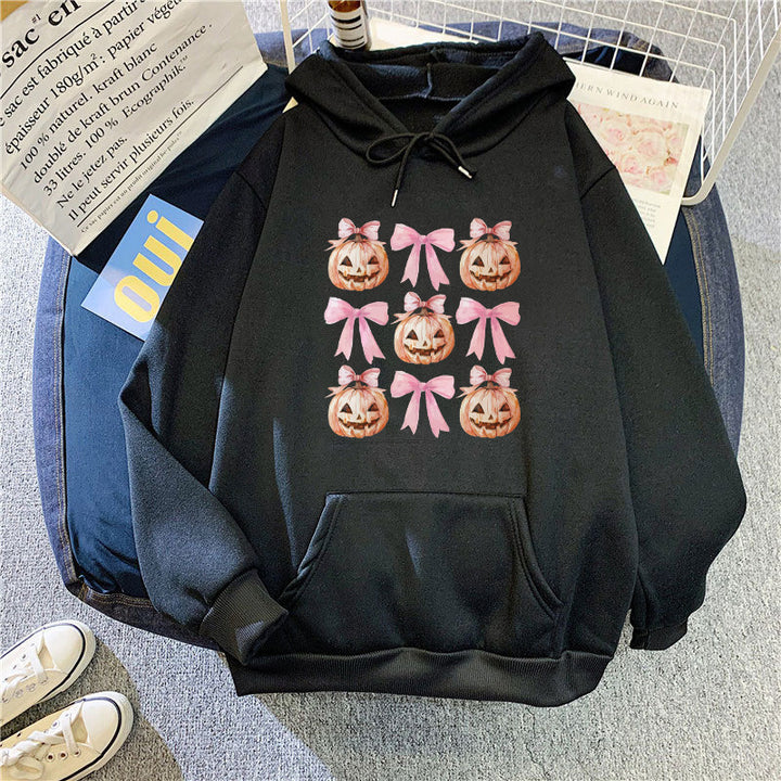 Women's Hoodie with Cheerful Pumpkin Design Chic & Stil