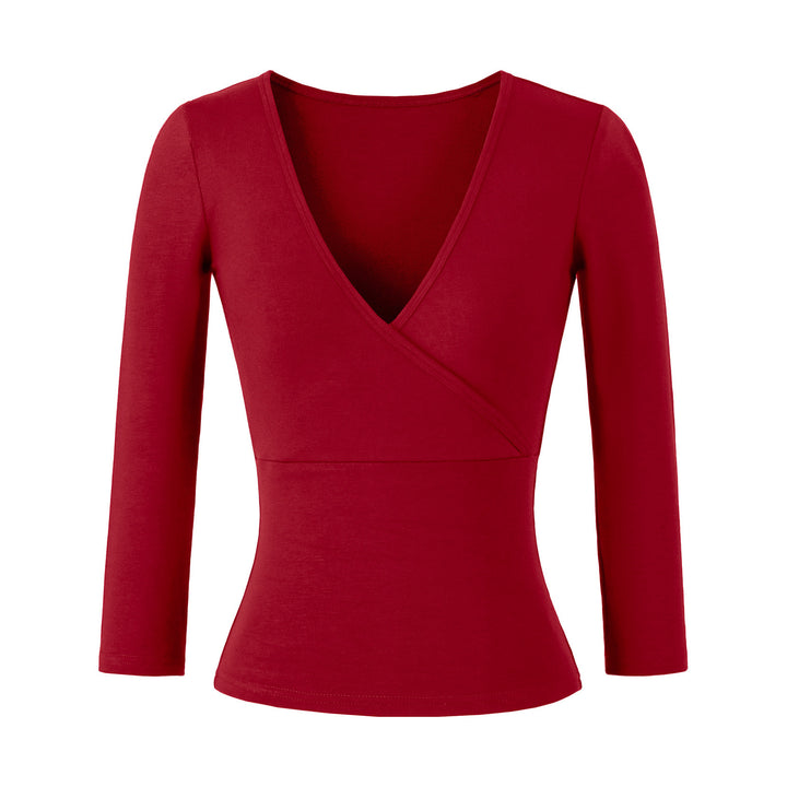 Women's figure-hugging wrap top made of stretch jersey with deep V-neck and tailored silhouette.