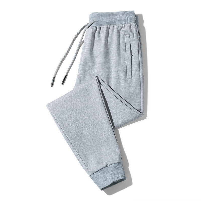 Men's fleece jogging pants with drawstring, zippered pockets, and elastic cuffs Amarae