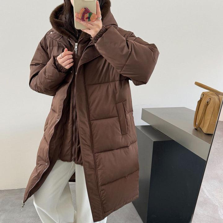 Ladies elegant winter padded parka with faux fur collar and practical pockets Lune London
