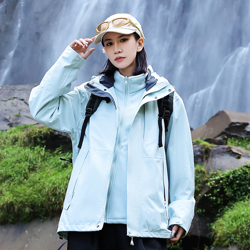 Women’s technical multi-layer hardshell rain jacket with adjustable hood, chest strap, and water-resistant zippers Amarae