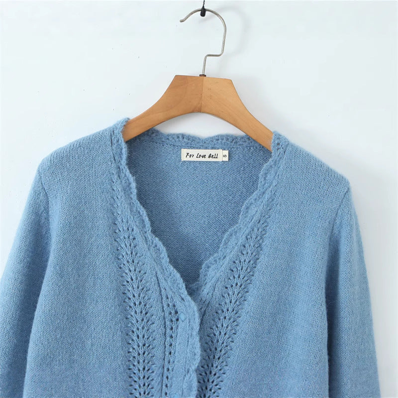 Women's knitted jacket with romantic openwork patterns and Lune London button details