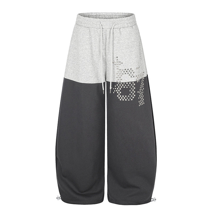 Women's Oversize Two-Tone Palazzo Sweatpants made of French Terry with logo studs, drawstring and adjustable hem.