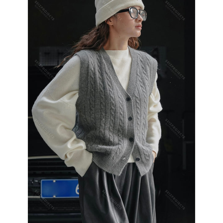 Women's chunky knit cable vest with deep V-neck and button placket Amarae