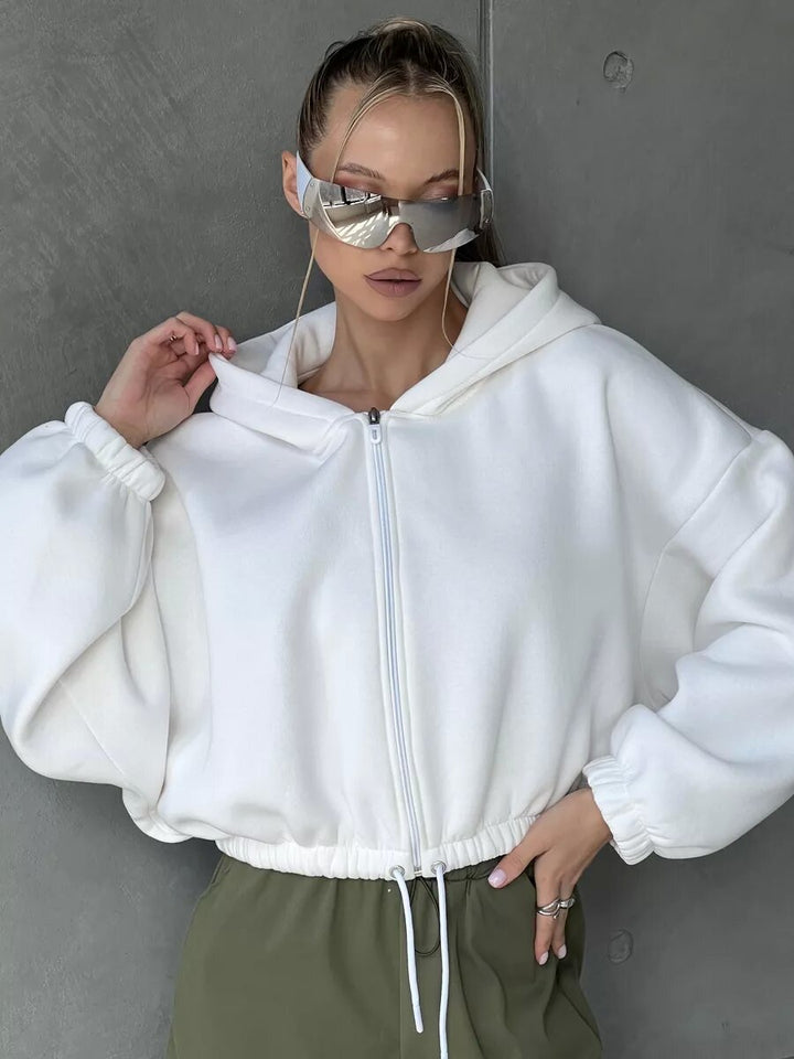 Ladies Cropped Hoodie made of soft sweat fabric with elastic waistband and zipper Chic & Stil