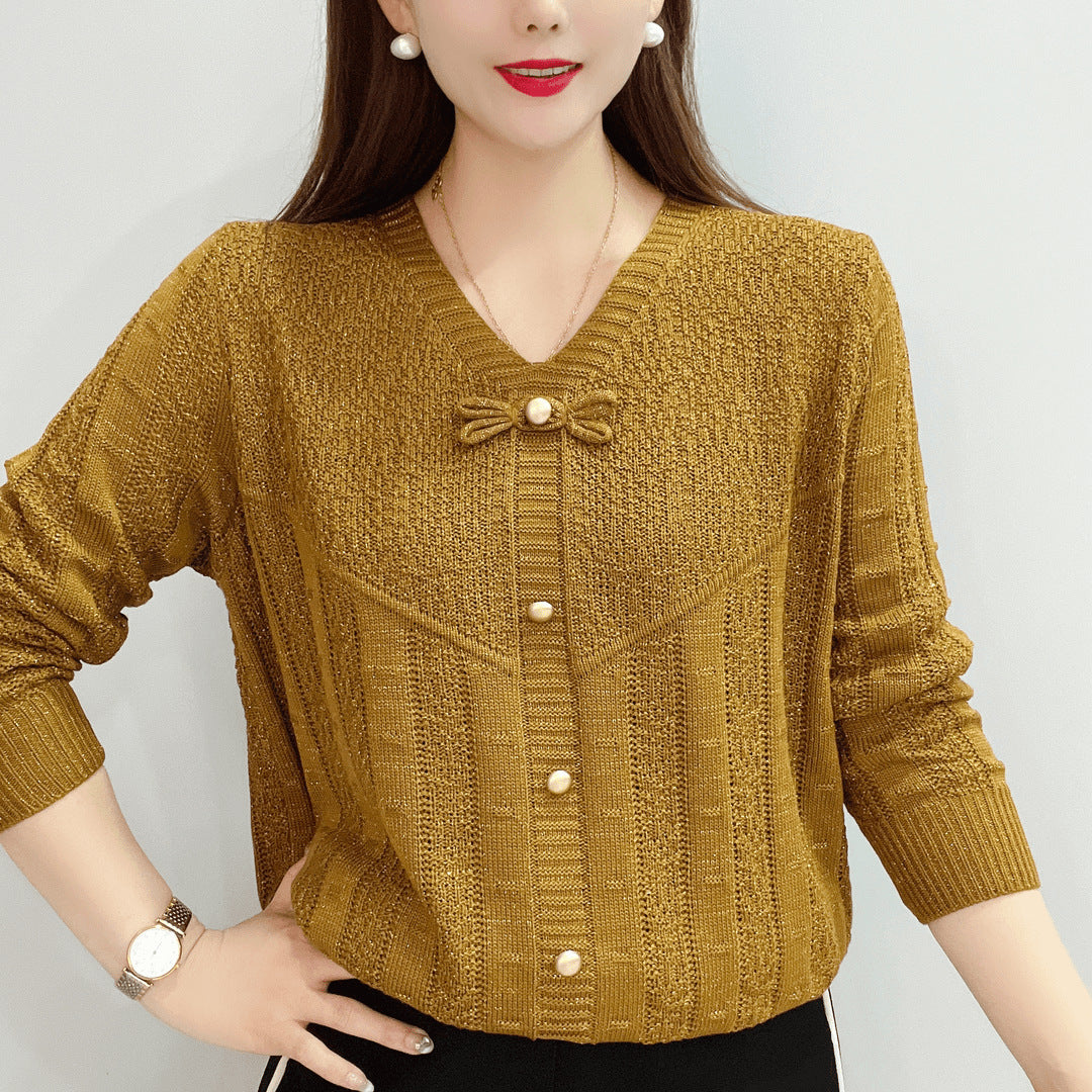 Women knit top with decorative pearl buttons and a refined bow design Lune London