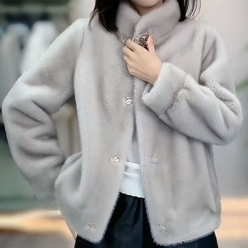 Veste en fleece confortable pour femme avec des détails de boutons élégants Chic & Stil