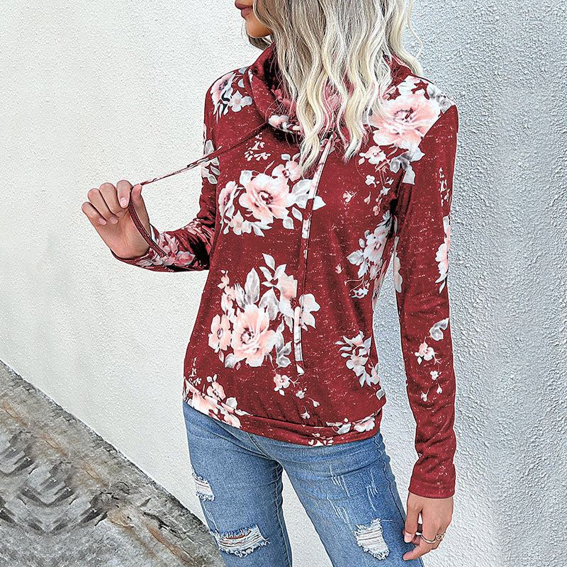 Pull femmes avec motif floral et col haut Chic & Stil
