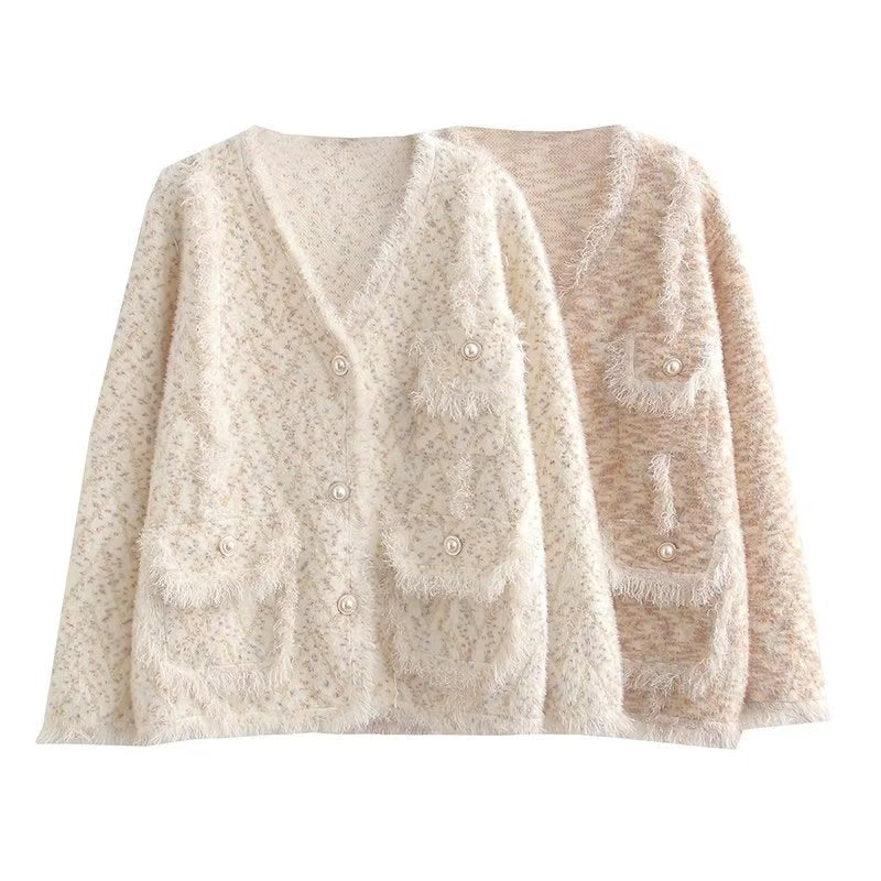 Women's fashion chunky knit cardigan with decorative V-neck and practical pockets Lune London