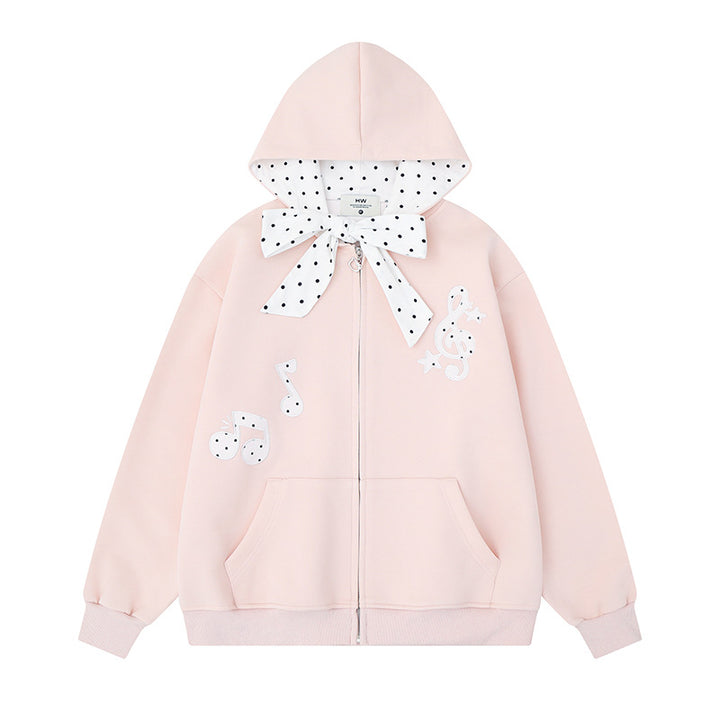 Women's hooded sweat jacket with polka dot hood lining, decorative bow, and music notes motif Amarae