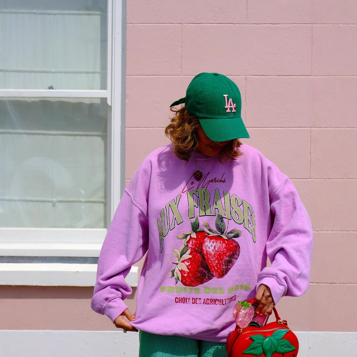 Trendy women's sweatshirt with a catchy strawberry design and a comfortable fit Lune London