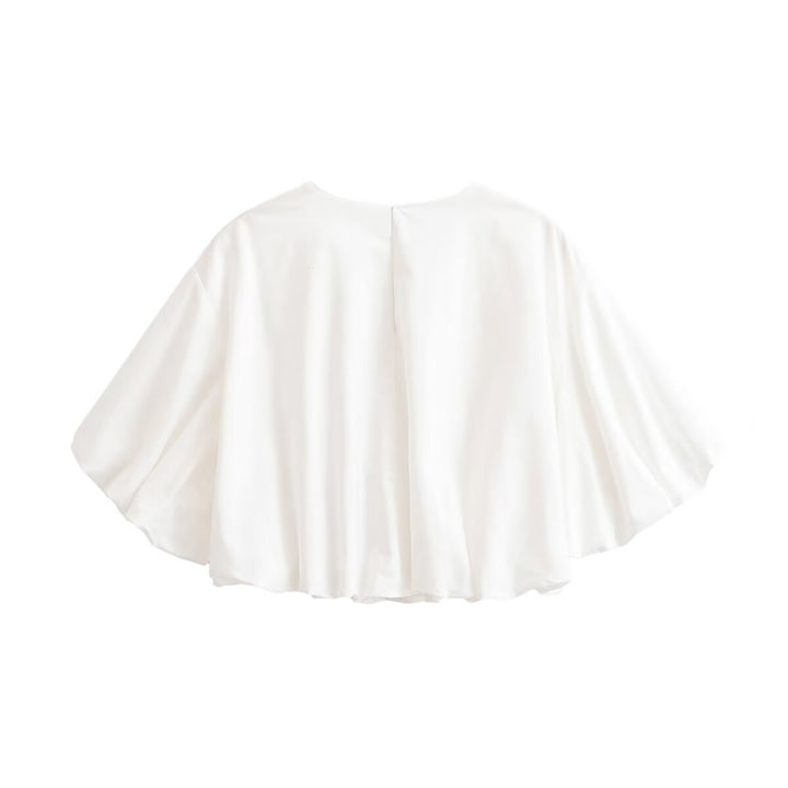 Women's loose cape top made of flowing satin with round neck