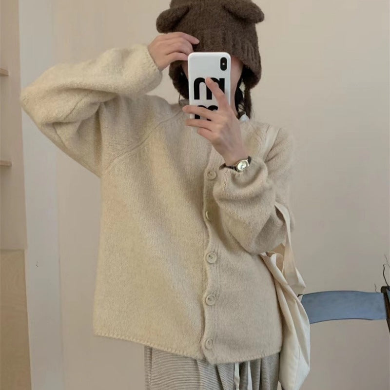 Cardigan confortable pour femmes avec détails de boutons et coupe ample Chic & Stil