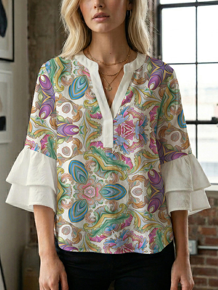 Ladies elegant top with voluminous ruffle hems and floral design Lune London