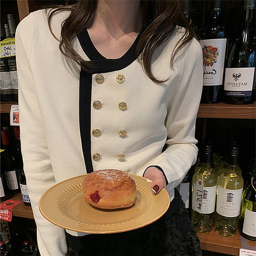 Elegant ladies cardigan with gold button details and contrasting finishes Amarae
