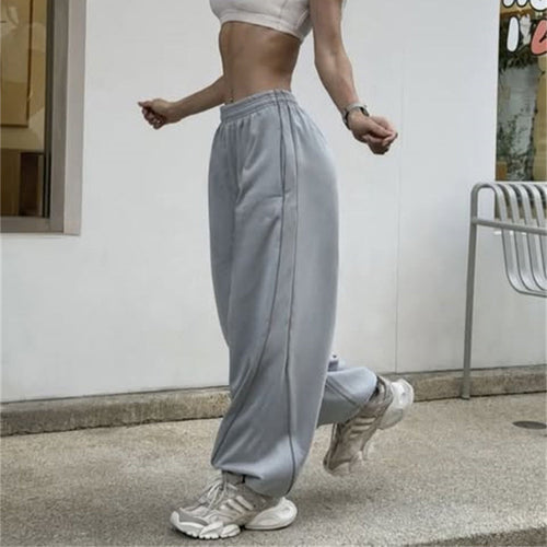 Casual sports pants for women with side stripes and practical pockets Amarae