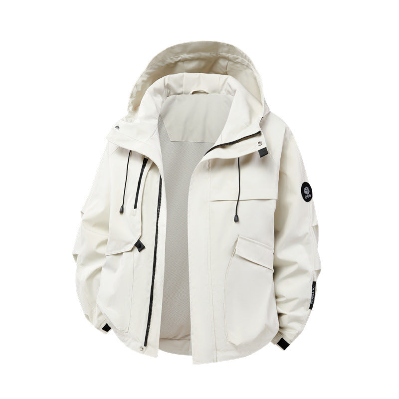 Technical outdoor jacket for men in waterproof material with numerous zippered pockets Lune London