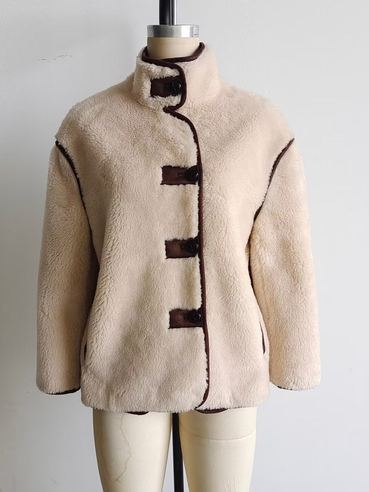 Faux fur jacket for women with a stylish high collar and practical pockets Lune London