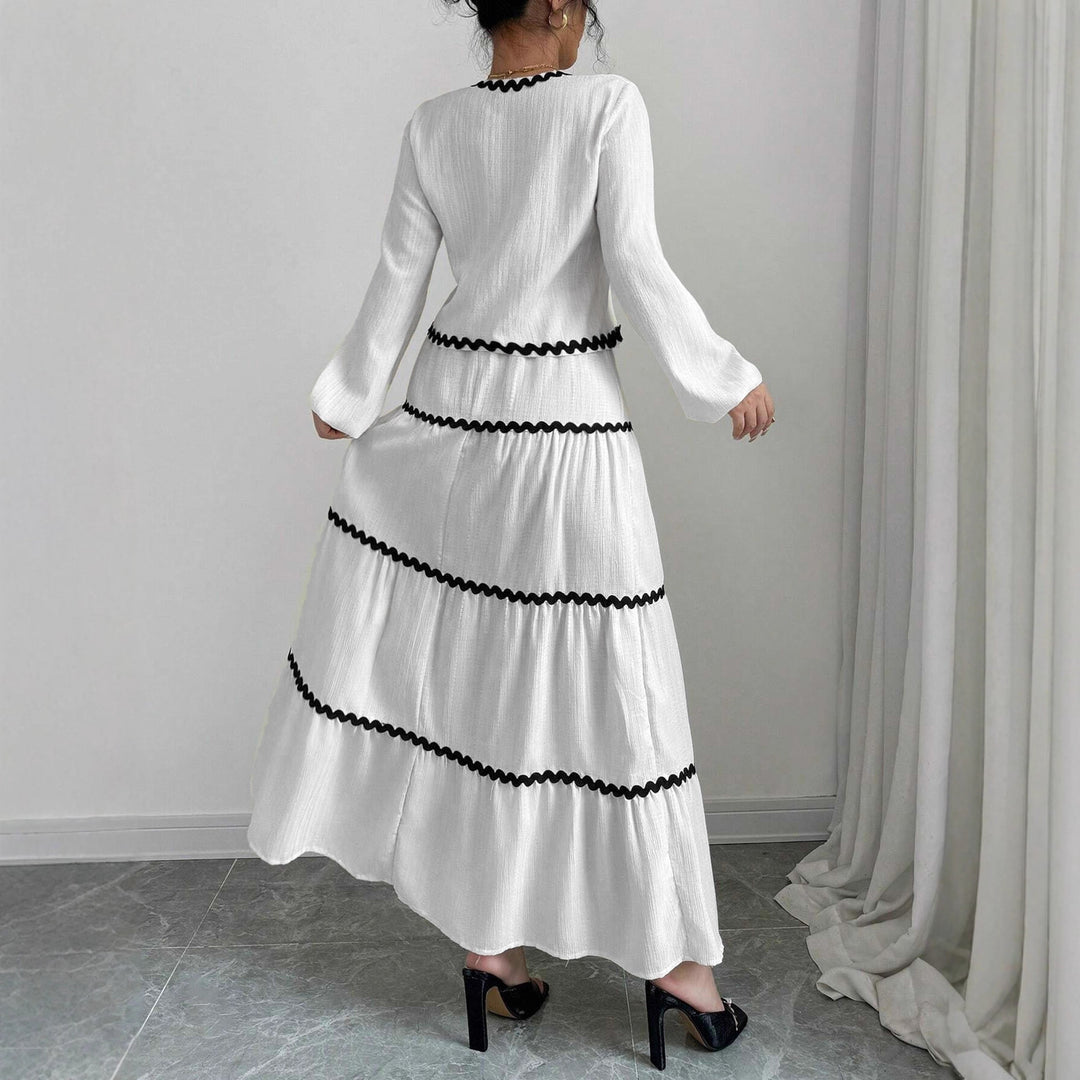 Maxi dress for women with playful lace-up neckline and elegant ruffled skirt Lune London