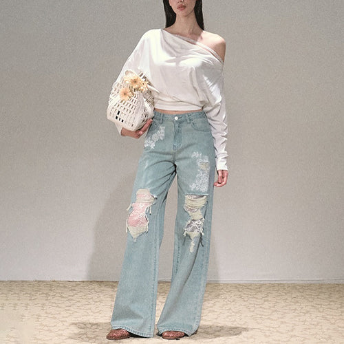 Women's wide cut jeans with individual destroyed details and floral print Amarae