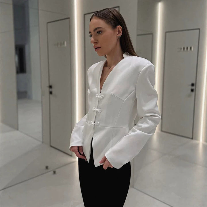 Women's peplum blazer with mandarin-like neckline and decorative knot fastenings Amarae