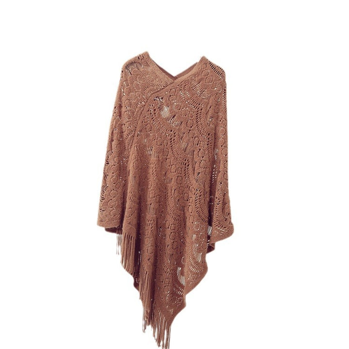 Ladies' knitted poncho with artistic crochet patterns and fringes Lune London