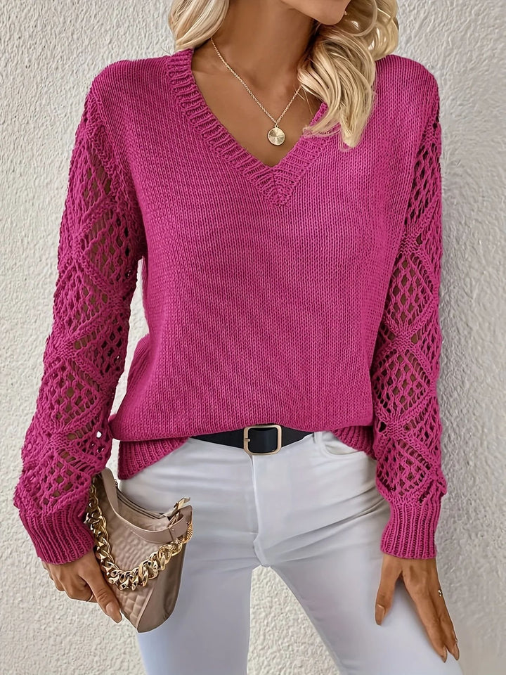 Knitted sweater for women with refined lace sleeves and a chic V-neck