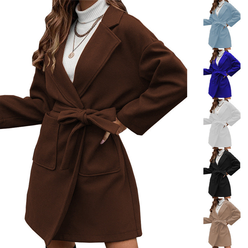 Ladies wrap coat with tie belt, large flap pocket and lapel collar Amarae