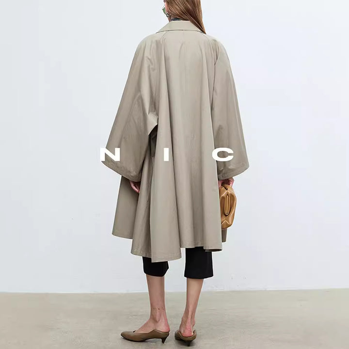 Manteau de trench décontracté pour femmes avec des manches surdimensionnées et des détails de boutons Chic & Stil