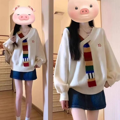 Pull élégant pour femme avec col en V et rayures colorées Chic & Stil